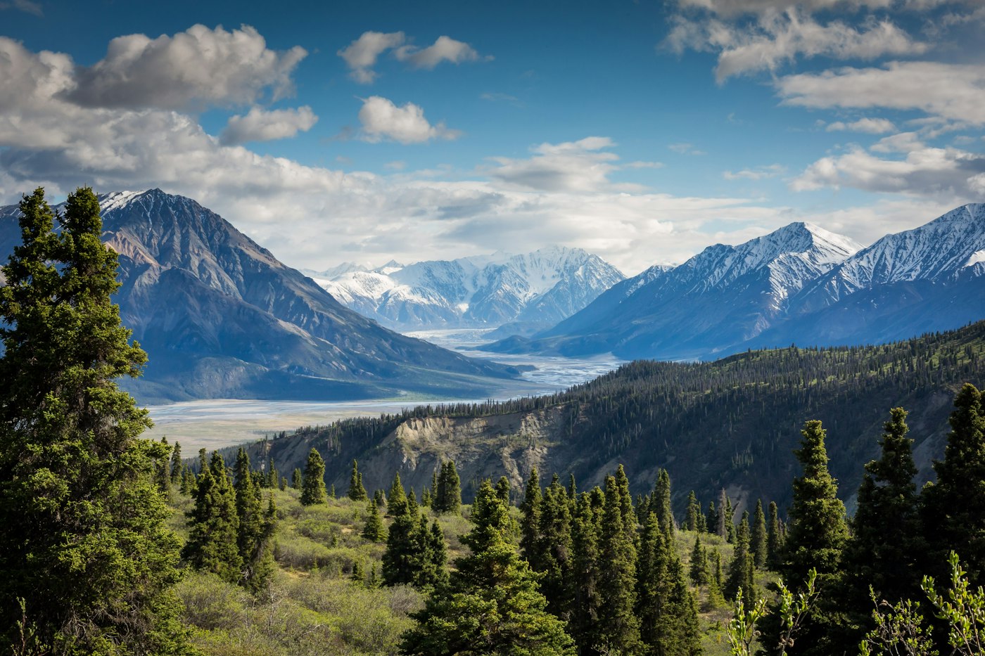 Mountain peaks above a cloud-filled valley